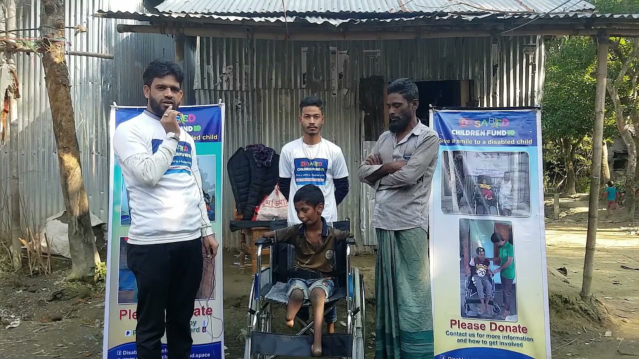 Rezaul Islam receiving a wheelchair